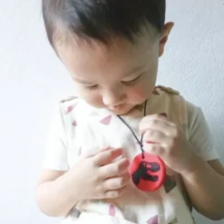 Collier dino - rouge et noir